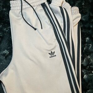 Adidas beige Joggers with Black Stripes